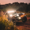 quattro led lights mounted as a ditch light on a jeep